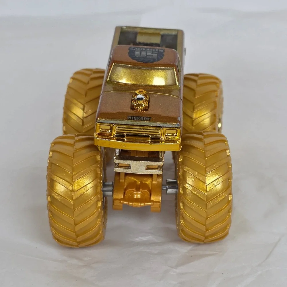 Hot Wheels Monster Trucks Bigfoot 4x4 50th Anniversary Gold 1:64 Scale Die-Cast